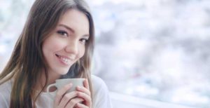 smiling-female-with-coffee